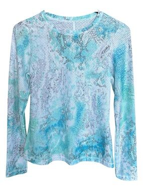 Women's Sofibella activewear turquoise long sleeve top.